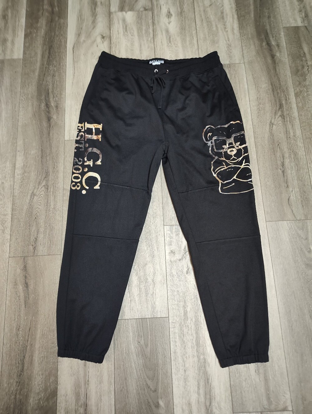 Hustle Gang Black Jogger Sweatpants with Gold Bear Graphic